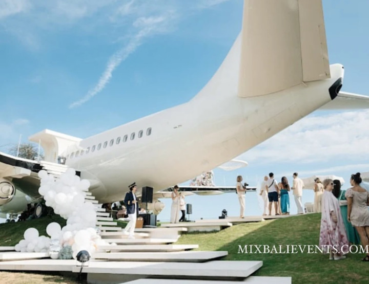 Private Jet Villa - A plane on a cliff over the ocean