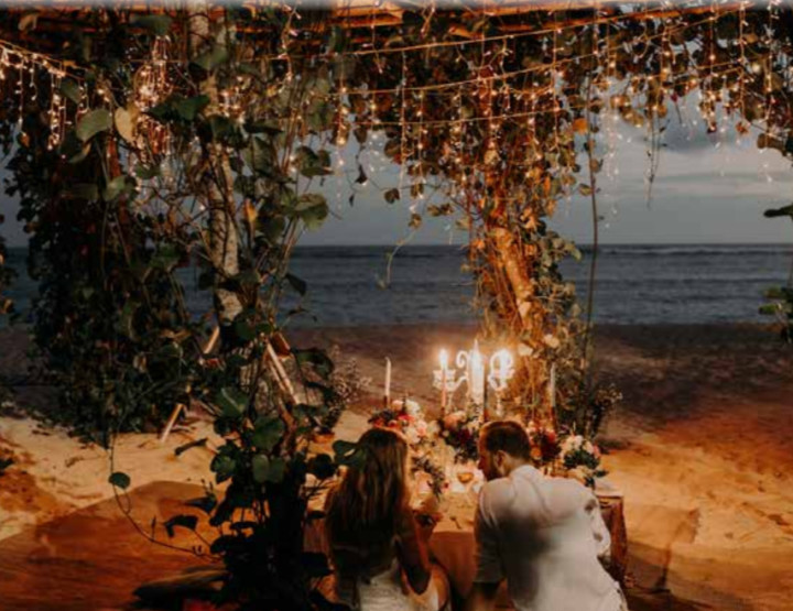 Romantic dinner in a gazebo on the beach